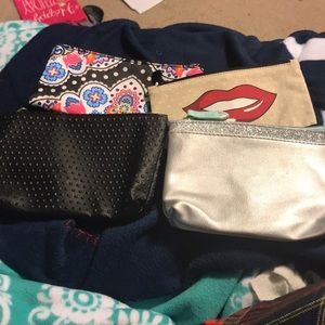 Sold Lot of four make up bags.